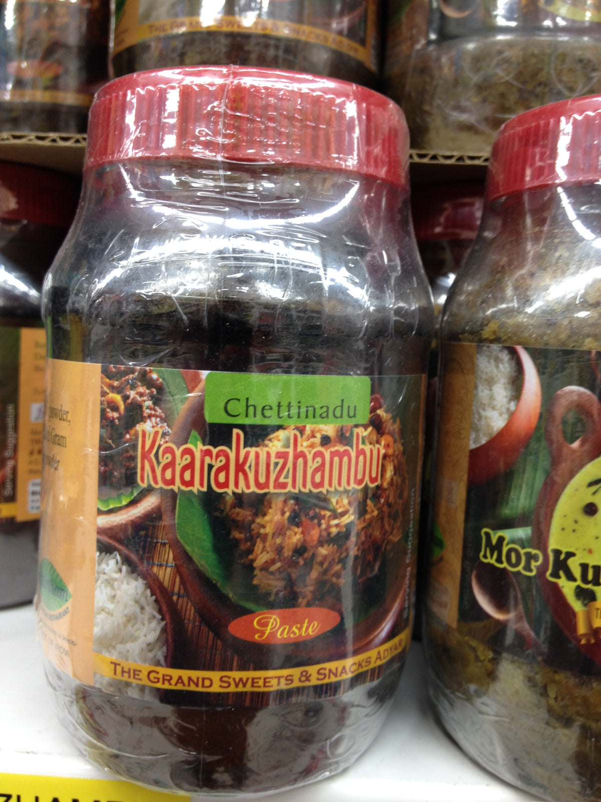 The Grand Sweets & Snacks Kaarakuzhambu  OZ -  Gms