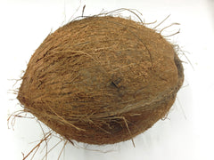 Whole brown coconut with its husk  for Puja -Pooja